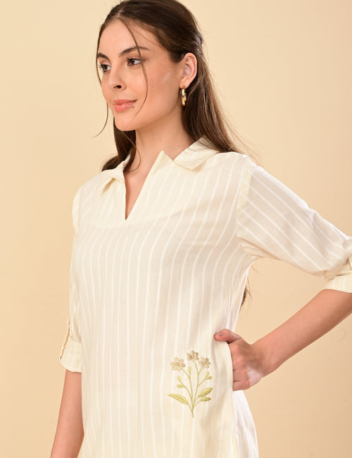 A fluid ivory Co-ord set with fine stripes and a gentle embroidery